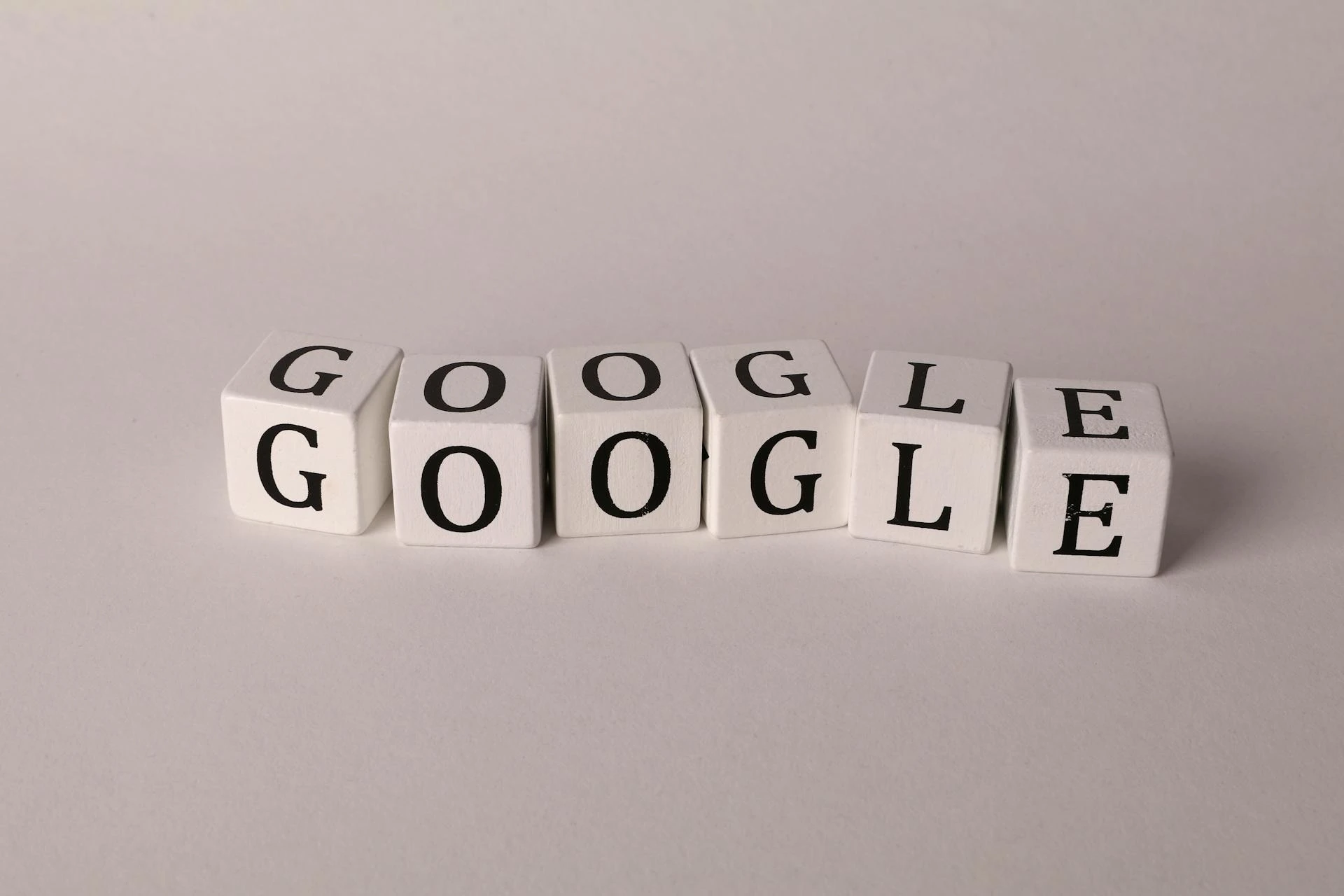 Google logo with a visual representation of online presence optimization, featuring search engine results and digital marketing elements